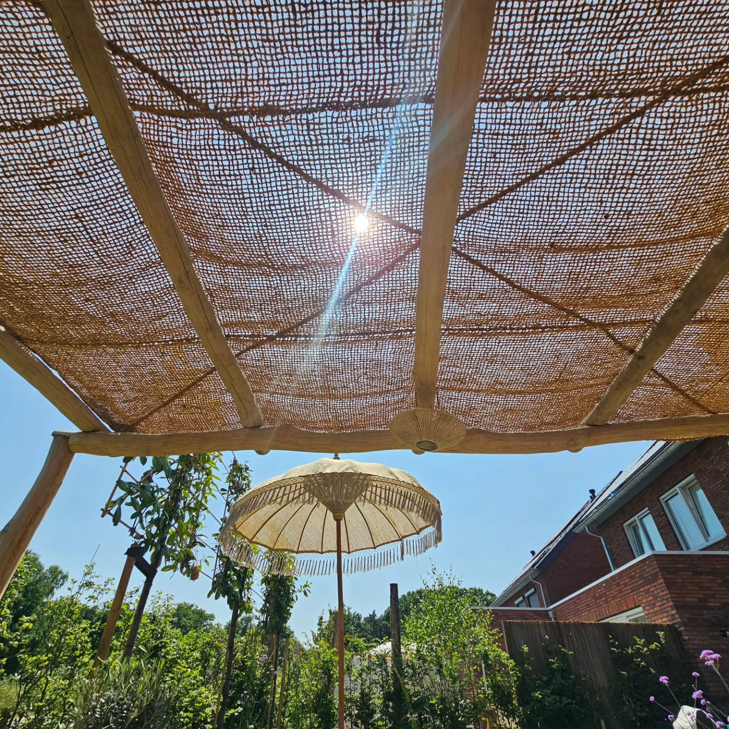 shade-sail-with-sun-shining